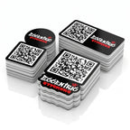 Stacks of custom QR code stickers in square, rounded and circular shapes, each printed with a scannable code beside the Eccentric Stickers logo