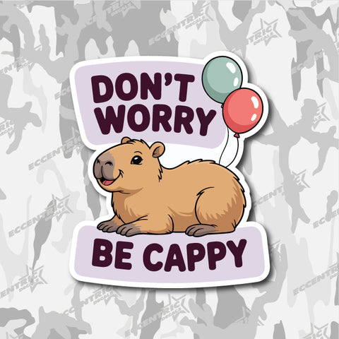Don't Worry, Be Cappy — an Eccentric Stickers design: a capybara lying down with two balloons